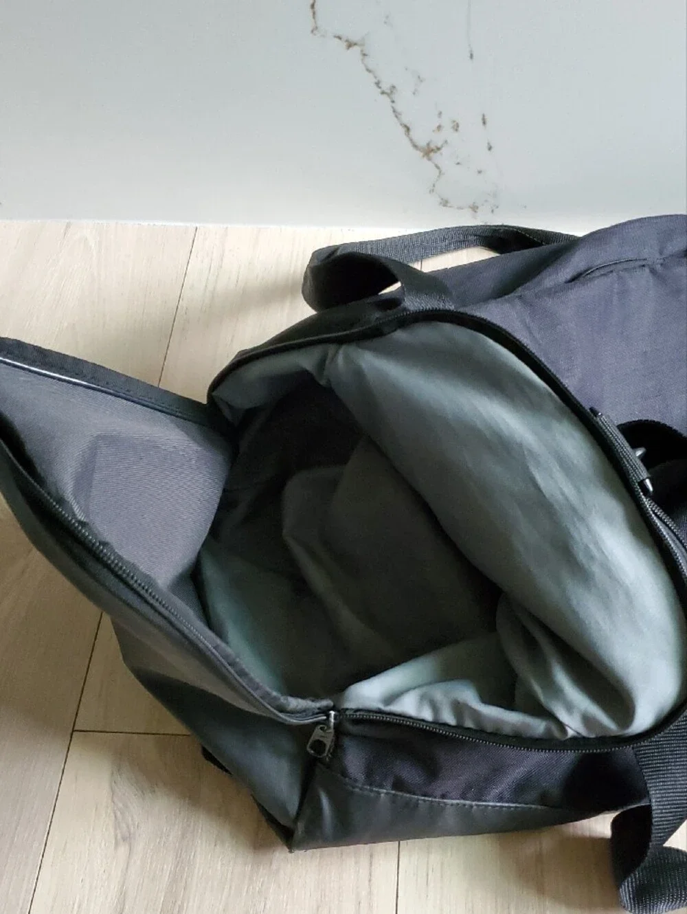 Nike Black Duffel Bag with White Swoosh